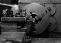 Grayscale Photo of a Lathe Machine